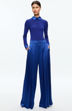 Pleated details add to the fabulous flow of wide-legged pants cut from lustrous satin and colored in a royal hue. 38" leg opening Zip fly with hook-and-bar closure Side-seam pockets; back welt pockets Lined 75% triacetate, 25% polyester Dry clean Imported Satin Pants, Stylish Clothes For Women, Skin Care Women, Comfortable Dress, Fashion Help, Wide Leg Trousers, Alice Olivia, Holiday Outfits, Satin Finish