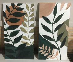 two paintings with leaves painted on them