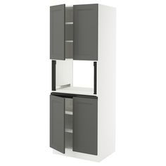 a white and gray cabinet with two doors on each side, one door open to reveal the other