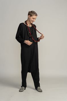 A great black harem jumpsuit with sleeves for women is both unique and very stylish. It has a round neck line and is loose on the body which makes it super comfortable. The jumpsuit is made of high quality Lycra, ad has two side pockets and a zipper in the back. This great romper jumpsuit can be worn with flats for a casual everyday look, and easily transformed into a gorgeous night outfit by pairing it with a high heels and some accessories. Material: 47% modal 47% cotton 6% lycra ONE SIZE - me Long Sleeve Black Jumpsuits And Rompers For Loungewear, Black Long Sleeve Jumpsuits For Loungewear, Sleeves For Women, Harem Jumpsuits, Jumpsuit With Pockets, Boho Jumpsuit, Womens Jumpsuits, Long Romper, Romper Jumpsuit