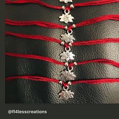 Handmade Om lotus rakhis  Available in plenty of colours Red Bracelets With Latkans For Puja, Bohemian Red Bracelets For Diwali, Red Bracelets For Navratri Rituals, Adjustable Red Bracelets With Latkans, Rakhi Cards, Diwali Cards, Raksha Bandhan Gifts, Round Gift Boxes, Handmade Rakhi