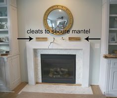 a fireplace with a mirror above it and the words cleats to secure mantle below