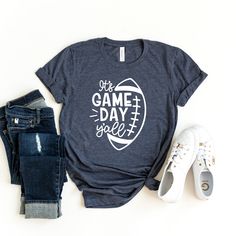 This It's Game Day Yall Shirt is the best for Sunday Football Season                                                     ⭐  HOW TO ORDER   ⭐  1-) Please check all the photos from the listing. 2-) Please choose your shirt size and color. (Shirt sizes are shown on the listing photos) 3-) Please choose your quantity. 4-) Click add to cart. If you would like to order more than one shirt, you can easily go back to the listing and do the same thing for the other shirts you would like to purchase. 5-) Then please click Proceed to checkout. You are all set !                                                    ⭐  FABRICATION  ⭐  ⭐⭐ Our product distrubutor BELLA + CANVAS  is well known for their soft, and comfy clothing.  Our solid colors are:  White Black Red Pink Kelly %100 ring-spun cotton.  Our h Funny Football Shirts, Football Fan Shirts, Sunday Football, My First Rodeo, Funny Football, First Rodeo, Football Mom Shirts, Shirt Football, Football Funny