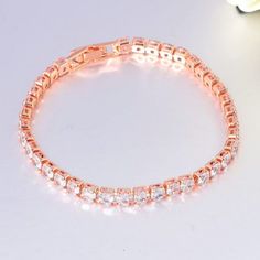 Brand New Women's Pink Rose Gold Diamond Tennis Bracelet Available In Two Sizes: Standard 7 Inch (The Most Common Women's Size) Large 8 Inch (If You Desire A Slightly Bigger Size) Width 4mm 14k Rose Gold Plated Sterling Silver Genuine 1ct Lab Created Diamonds Retail Price $350 Buy With Confidence From A Trusted Seller With A 99%+ Feedback Rating! A0196 (Id-215) Rose Gold Tennis Bracelet With Cubic Zirconia, Rose Gold Crystal Bracelet For Anniversary, Dazzling Rose Gold Tennis Bracelet With Cubic Zirconia, Dazzling Rose Gold Cubic Zirconia Tennis Bracelet, Luxury Rose Gold Diamond Bracelet With Sparkling Stones, Rose Gold Diamond Bracelet With Sparkling Stones, Elegant Rose Gold Cubic Zirconia Tennis Bracelet, Elegant Rose Gold Crystal Bracelet For Anniversary, Formal Sparkling Rose Gold Bracelets