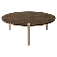 an oval marble coffee table with two metal legs and a circular top, viewed from the front