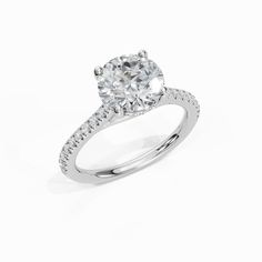 a diamond engagement ring on a white background