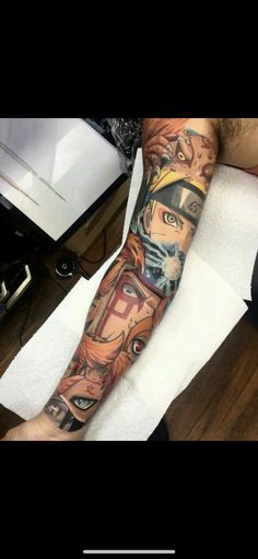 an arm with some anime characters on it