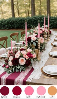 the table is set with candles, plates and flowers in shades of red, pink, yellow, and green