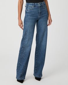 Be a showstopper this season in our crystal-embellished Sasha jeans. This high-rise wide leg is designed with a fitted top block and a slightly relaxed fit in a medium wash with marble texture throughout. This pair is crafted from our PAIGE VINTAGE denim which takes all of the work out of breaking in your favorite pair of vintage jeans. We've combined the comfort of stretch with everything you love about authentic vintage denim to create super soft jeans that feel perfectly lived-in from the ver Medium Wash Embellished Straight Leg Bottoms, Glamorous Straight Leg Denim Bottoms, Crystal Embellished Denim Jeans, Embellished Flare Jeans For Spring, Chic Straight Leg Bottoms With Rhinestones, Chic Straight Leg Jeans With Rhinestones, Elegant Embellished Denim Bottoms, Chic Rhinestone Jeans For Spring, Chic Embellished Denim Jeans