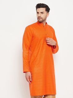 VM BY VASTRAMAY Men's Orange Silk Blend Kurta Embrace traditional elegance with the VM BY VASTRAMAY Men's Orange Silk Blend Kurta. Perfect for festive occasions, this kurta combines style and comfort, making it a must-have for your ethnic wardrobe. Features Elegant orange color Silk blend fabric for a rich look Intricate embroidery detail Comfortable fit for all-day wear Full sleeves and a mandarin collar Specifications Brand: Vastramay Material: Silk blend Color: Orange Pattern: Solid with embr Formal Cotton Kurta For Festivals, Formal Festival Cotton Kurta, Long Sleeve Cotton Kurta For Celebrations, Orange Pattern, Embroidery Details, Mandarin Collar, Full Sleeve, Orange Color, Must Haves