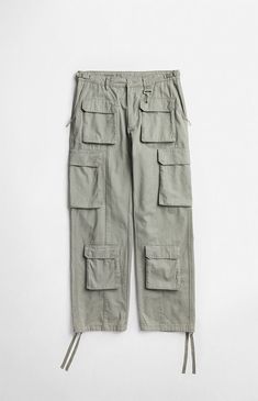 Step into comfort and functionality with the Cotton Cargo Pants from RC Outdoor Supply. Designed with adjustable side tabs, a zip fly closure, and cargo pockets throughout, these pants offer ample storage for your essentials. The drawcord leg hems and wide leg openings enhance the baggy, relaxed fit, making them ideal for any adventure or everyday wear.20" leg opening32" inseam10.75" riseAdjustable side tabsCargo snap-button pockets throughoutSide zipper slant pocketsSoft-touch metal coated hookSignature rock 4-hole button closureBranded clasp for twill tape adjusters at waistbandTwill tape at the bottom hemDrawcord leg hemsBaggy relaxed fitWide leg openings100% cottonHand washMeasurements taken from a size 32 RC Outdoor Supply Mens Cotton Cargo Pants - Sage size 34W 31L Utility Work Pants With Multiple Pockets, Functional Straight Leg Pants With Cargo Pockets, Functional Straight Leg Work Pants With Pockets, Functional Straight Leg Parachute Pants With Cargo Pockets, Functional Wide-leg Cargo Pants With Multiple Pockets, Functional Wide-leg Cargo Pants With Side Pockets, Functional Straight Leg Cargo Pants, Functional Straight Leg Parachute Pants With Multiple Pockets, Functional Parachute Pants With Multiple Pockets