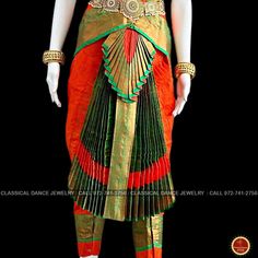 Design by Classical Dance Jewelry® ❥ Traditional Bharatanatyam costume wore during regular dance programs or arrangetram performance. ❥ Material : Art Silk ❥ Type : Traditional pant costume ❥ Easy to wear ❥ layer front fan ❥❥❥❥ 32 inch PANT LENGTH Dress Measurements ( all the measurements approximately 1 -2 margin buffer) Age: 9 - 12 yrs ❥ PANT MEASUREMENTS: ☛ Pant Length: 31-32 inch ☛ Pant Waist: 29-30 inch ☛ Pant Hip: 30-31 ❥ BLOUSE MEASUREMENTS: ☛ Blouse length: 11-12 inch ☛ Blouse Shoulder : Traditional Green Churidar For Navratri, Traditional Green Churidar With Drape, Ceremonial Green Sets With Traditional Patterns, Festive Green Churidar For Ceremonial Occasions, Festive Green Ceremonial Churidar, Ceremonial Green Churidar With Zari Work, Green Traditional Drape Set For Puja, Traditional Green Churidar With Pallu, Green Churidar With Zari Work For Ceremonial Occasion