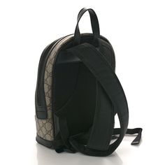 This is an authentic GUCCI GG Supreme Monogram Small Eden Day Backpack Black. The bag features an external zipper pocket, nylon shoulder straps, and black leather trim with silver hardware. The top zipper opens to a spacious taupe suede leather interior with zipper and flat pockets. Day Backpacks, Black Backpack, Silver Hardware, Suede Leather, Eden, Black Leather, Monogram, Backpacks, Gucci