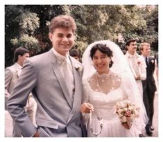 a bride and groom posing for a photo