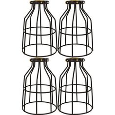 three black metal caged vases with gold accents