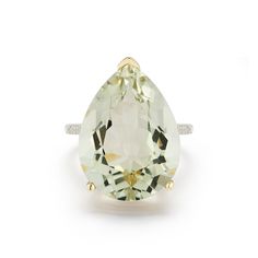 14kt Green Amethyst Tear Drop Ring Bold tear drop Green Amethyst is beautifully set in solid gold and accentuated with diamonds on the shank. This ring is bound to stand out and catch everyone's attention. We adore simply bold statement ring. 14kt Yellow Gold 4.45gm Gold 0.15ct Diamonds 39.75ct Pear Drop Green Amethyst 20mm x 15mm Green Amethyst Made in New York Teardrop Amethyst Ring For Anniversary, Elegant Teardrop Amethyst Ring For Formal Occasions, Formal Teardrop Amethyst Ring, Elegant Teardrop Ring With Gemstone Accents, Formal Teardrop Amethyst Ring In Fine Jewelry Style, Elegant Teardrop Rings With Gemstone Accents, Elegant Teardrop Amethyst Gemstone Ring, Teardrop Amethyst Ring For Formal Occasions, Drop Ring