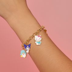 Celebrate the magic of friendship with the Sanrio Hello Kitty and Friends Charm Bracelet. This playful bracelet features an array of adorable charms, each representing Hello Kitty and her beloved friends. With its vibrant colors and delightful designs, this charm bracelet is the perfect accessory for any Sanrio fan. Cute Multicolor Jewelry With Removable Charms, Cute Jewelry With Removable Charms For Friendship, Cute Blue Charm Bracelet For Friendship, Friendship Novelty Charm Bracelet, Playful Friendship Charm Bracelet, Kawaii Jewelry With Cute Adjustable Design, Adjustable Cute Kawaii Jewelry, Adjustable Kawaii Jewelry With Cute Design, Cute Charm Bracelet With Removable Charms As Gift