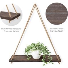 the hanging shelf is made out of wood and has two ropes, one with a potted