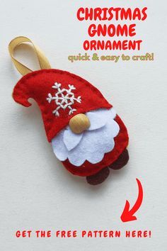 an ornament with a santa clause on it and the text get the free pattern here