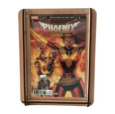 a wooden box that has a comic cover on it