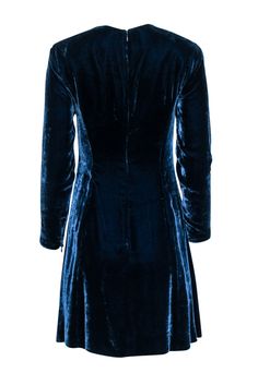 Get ready to make a statement in this Ralph Lauren teal velvet dress! Perfect for any cocktail party, this dress features long sleeves and a rich teal blue color. Dress it up with some statement jewelry and a classic pump. Show off your unique style and stand out from the crowd! Size 6 75% Rayon, 25% Silk Unlined Invisible back zipper Shoulder pad detail Long sleeves Bust 32" Waist 30" Shoulder to hem 35.5" Sleeve length 23" Blue Long Sleeve Dress For Fall Party, Blue Long Sleeve Party Dress For Fall, Fitted Velvet Long Sleeve Dress For Formal Events, Blue Long Sleeve Dress For Formal Fall Occasions, Formal Blue Long Sleeve Dress For Fall, Formal Long Sleeve Blue Dress For Fall, Fitted Long Sleeve Velvet Dress For Formal Occasions, Fitted A-line Velvet Dress For Formal Occasions, Fitted Velvet Formal Dress For Fall