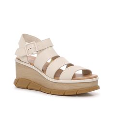 SOREL-Joanie II Wedge Sandal Give your warm weather wardrobe a stylish lift with the Joanie II wedge sandal from Sorel. This leather pair features a strappy upper and a wood-inspired wedge set above a chunky sole for trendy appeal. Sandals Outfit, Sneaker Brands, Athletic Sneakers, Wedge Sandal, Leather Fabric, Beautiful Shoes, Kids Bags, Strap Sandals, Wedge Heels