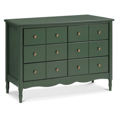 a green dresser with many drawers and gold knobs