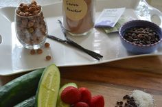 some fruit and nuts on a white tray