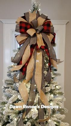 a christmas tree with a large bow on it