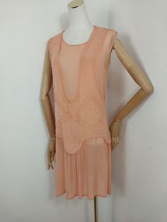 1920s peach flapper dress Beautifully beaded dress in peach and cream bugle beads  All intact may be one or two missing but not noticeable.  A tiny bit of damage on left shoulder see photo,  tiny repair  This is 100 year old dress,  a beautiful  piece of history,   that is still wearable  Perfect for a stylish weekend  or vintage party , day out or just to look at. No discolour to material  Good vintage condition  Measures bust 36" waist 36" hips 36"length 34" 1920s Day Dress, Old Dress, Peach And Cream, Old Dresses, Vintage Party, Bugle Beads, 1920s Fashion, Day Dress, Beaded Dress