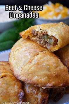 beef and cheese empanadas stacked on top of each other