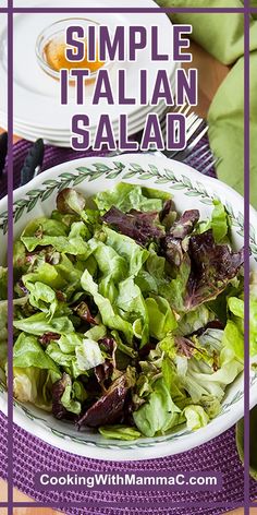 a salad with lettuce in a white bowl on top of a purple place mat