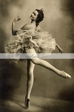 an old black and white photo of a ballerina