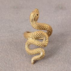 18k Gold snake ring,Snake Wrap Ring,adjustable snake ring,gold wrap ring,Gothic,Hippie,spiral ring,brass ring, Graduation Gift ,Vintage Ring Gemstone: -Na Jewelery Category:- Handmade Ring Metal:-Brass -- T H E * Q U A L I T Y We buy raw gemstones directly from miners and then get them cut and polished at our workshop , Therefore saving some bucks (additional added fees and markups) avoiding a middle man and making sure of the authenticity of the gems. And we use top quality materials that are w Gold Brass Snake Ring As Gift, Gold Brass Snake Ring For Gift, Gold Snake Ring As Gift, Handmade Gold Snake Ring, Snake Ring Gold, Gothic Hippie, Gold Wrap Ring, Spiral Ring, Gold Wrap