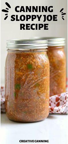 two jars filled with food sitting on top of a table