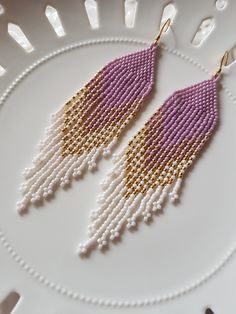 Long Deluxe seed bead Bohemian style dangle earrings. These Boho Style earrings have a hint of gold and a mix of musky Pinky/mauve colours. The ear wires are also gold Vermeil, (Gold plated over sterling silver) which is good for those with sensitive ears. The earrings, swing and dance and are approximately 11cm long, at their longest dangle, the other dangles are staggered. I have also used quality Japanese seed beads in these earrings. Seed Bead Earrings Tutorial How To Make, Caribou Tufting, Stitch Earrings, Beaded Things, Earrings Tutorial, Beaded Earrings Tutorials, Beaded Earrings Diy, Boho Style Earrings, Soldering Jewelry