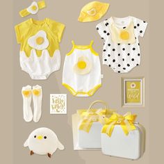 Buy a gift that new parents are going to be thrilled to receive. This gift bundle featuring baby rompers with egg yolk design, headband, socks, photo frame, soft toy and more is sure to please. The bundle comes neatly packed in a suitcase for added cuteness! Fabric: Cotton Inclusions: Set A and Set B3 Rompers1 Hat1 Headband1 Pair of Sock1 Stuff TotFram and Suitcase Set C and Set D2 Baby Outfits1 Hat1 Headband1 Pair of Sock1 Stuff TotFram and Suitcase Playful Sets For Easter Playtime, Playful White Sets For First Birthday, Cute White Easter Sets, Cute White Easter Outfit Set, Suitcase Set, Gift Bundle, Baby Rompers, Gift Bundles, Baby Gift Sets