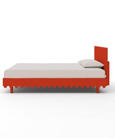 a bed with an orange headboard and foot board on it's side, against a white background