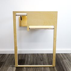 a wooden table with a shelf attached to it