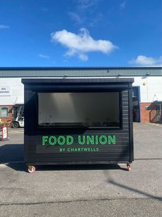 the food union by chartwells is located in an empty parking lot with no one around it