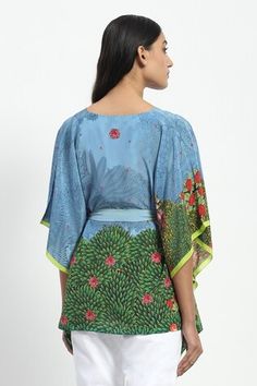 Green crepe short kaftan with Mughal inspired floral prints. Comes along with a belt. - Aza Fashions Summer Vacation Tunic Sets, Printed Tunic Sets For Summer, Summer Printed Tunic Sets, Summer Festive Digital Print Kaftan, Printed Silk Sets For Summer, Silk Summer Sets With Kimono Sleeves, Floral Print Tunic Set For Summer, Floral Print Summer Tunic Set, Summer Floral Print Tunic Set