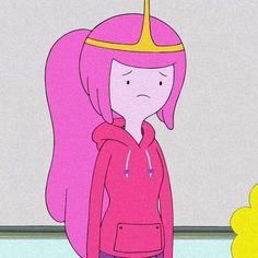 a girl with pink hair and a crown on her head standing in front of a wall