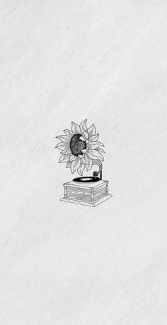 a drawing of a sunflower sitting on top of a record player in front of a white background