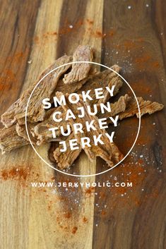 smokey cajun turkey jerk on a wooden cutting board with the words smoky cajun turkey