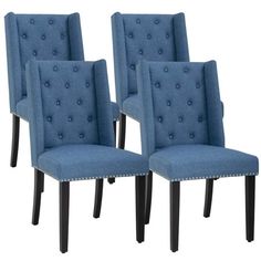 set of four blue upholstered dining chairs with nail head trimming on legs