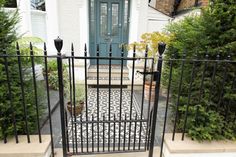 black wrought iron garden gate Wrought Iron Garden Gates, Iron Garden Gates, Wall Railing, Front Gardens, Front Garden Design, Edwardian House, Fence Ideas, Garden Gate, Garden Gates