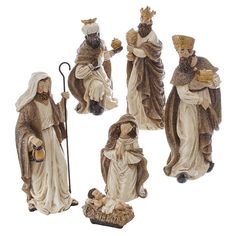 a group of figurines depicting the birth of jesus