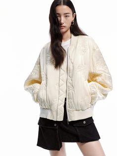 MO&Co. Women's Jacquard Detail Baseball Jacket This jacket is made from a comfortable silk and blend materials, its loose fit and elegant floral embroidery give a casual yet refined look. Thgivesded side pockets and lining make it perfect for cooler days. Features : - Loose baseball jacket silhouette- Side pocket, zipper closure- Sophisticated floral embroidery, lining quilting finish Code: MBD1COTT17The back length of size S is 59.5cmMATERIALS & CARE Material: 71.1% Viscose 28.9% SilkREMINDER: Fall Beige Outerwear With Floral Embroidery, Chic Floral Embroidered Outerwear For Spring, Beige Floral Embroidered Outerwear For Fall, Spring Chic Outerwear With Floral Embroidery, Cream Quilted Outerwear For Spring, Embroidered Cream Outerwear For Spring, Beige Winter Outerwear With Floral Embroidery, Winter Embroidered Outerwear With Baseball Collar, Spring Cream Quilted Outerwear