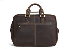 Handcrafted Vintage Extra Large Genuine Leather Travel Bag Duffle Bag Organizer Bag This Satchel is very exquisite, with Vintage styling; it is made of full grain leather and perfect for the consummate professionals, business men, lawyers, and more. This Messenger bag is perfect as your everyday bag, which can fit for a 14''-15'' Laptop, as well as many accessories. - Long Adjustable Shoulder Strap - Solid Quality Hardware - Fabric Lining - Inside laptop sleeve, wall zipper pocket, 1 cell pocket Brown Professional Satchel For Formal Use, Formal Leather Bag With Leather Backing, Luxury Business Satchel With Leather Backing, Elegant Formal Satchel With Leather Backing, Classic Formal Bags With Leather Backing, Formal Leather Satchel With Leather Backing, Elegant Briefcase With Leather Backing For Business Trips, Leather Satchel With Leather Backing For Formal Use, Formal Briefcase With Smooth Grain And Shoulder Strap