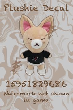 a small stuffed animal with a black shirt on it's face and the words, plushie decal